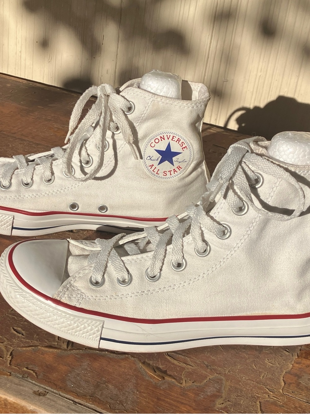 Converse White High Top Chuck Taylor All Star Sneakers with Red & Blue Trim